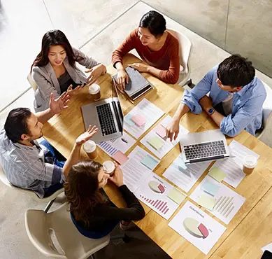 Group of young business professionals having a meeting